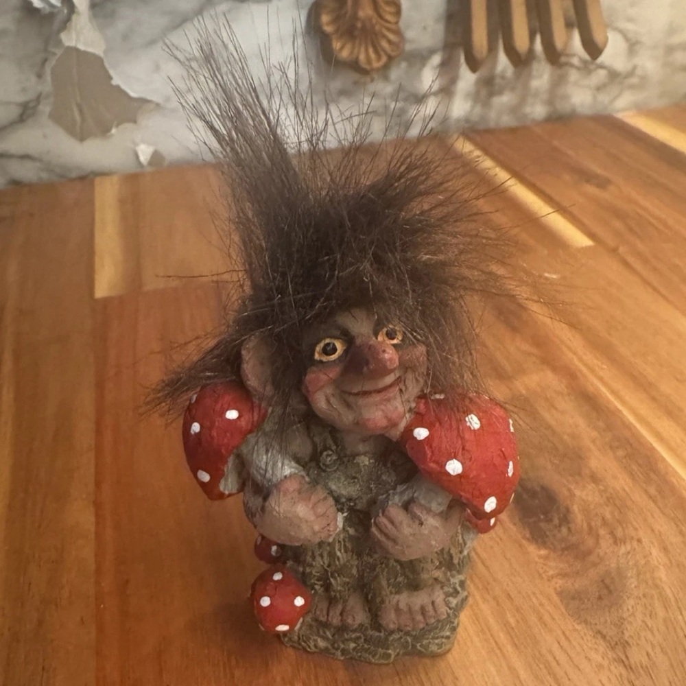 Whimsical Troll Figurine with Red Mushrooms
